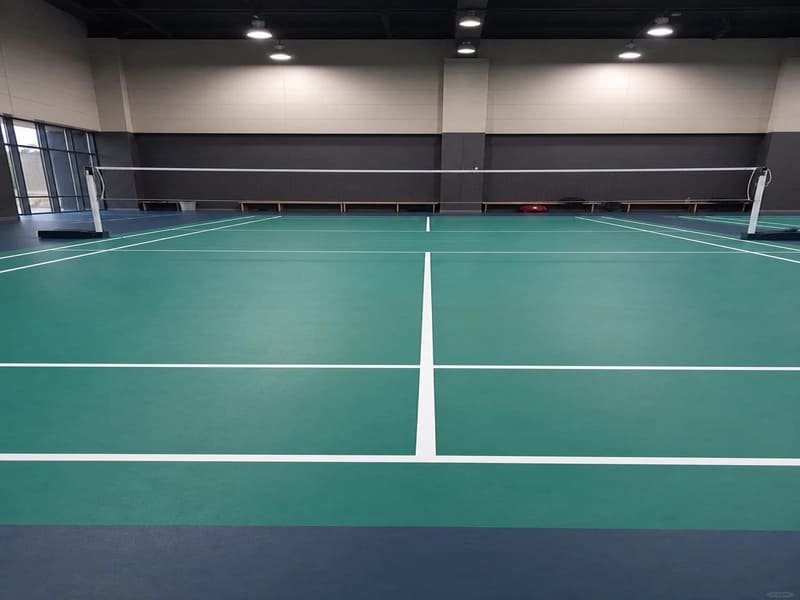 comparison of hardwood, PU, and PVC sports flooring